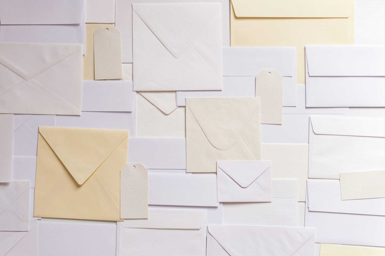 A flat lay of assorted blank envelopes and tags